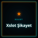 Xslot şikayet konularını inceleyen bir kullanıcının laptop ekranı